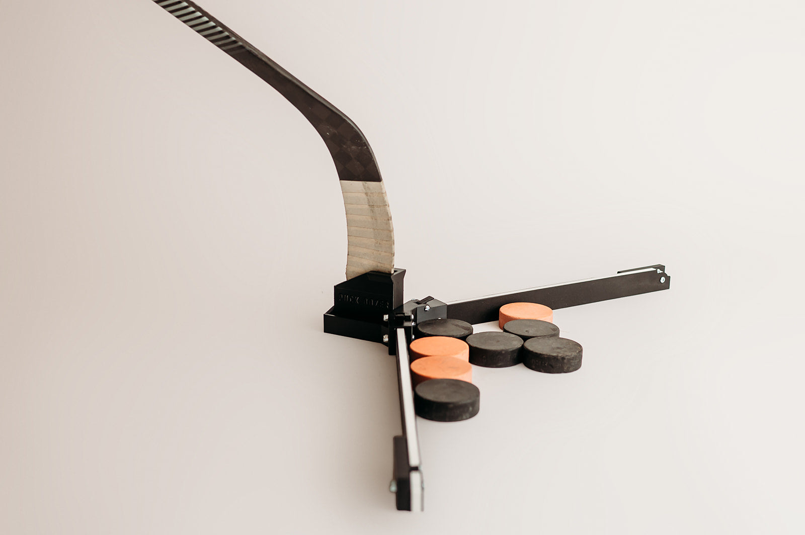 Puck Dozer™ | Patented Hockey Puck Collector & Training Deker