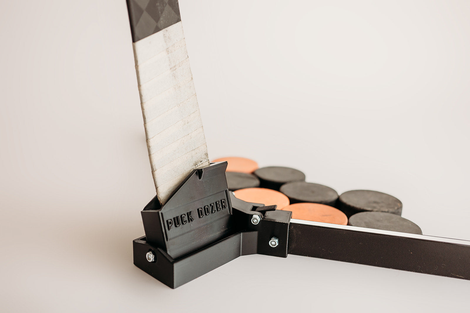 Puck Dozer™ | Patented Hockey Puck Collector & Training Deker